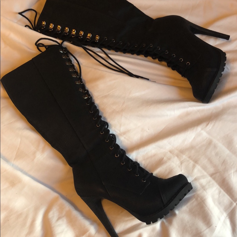 Laced up Black Leather Boots
